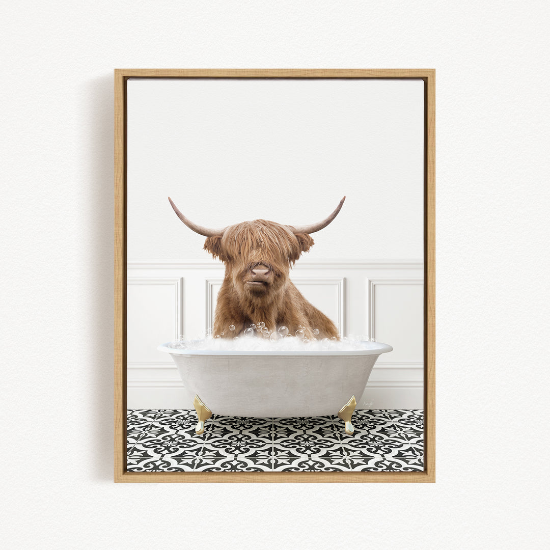 A Highland cow with shaggy brown hair is sitting in a white bathtub filled with bubbles, creating a whimsical and playful scene.