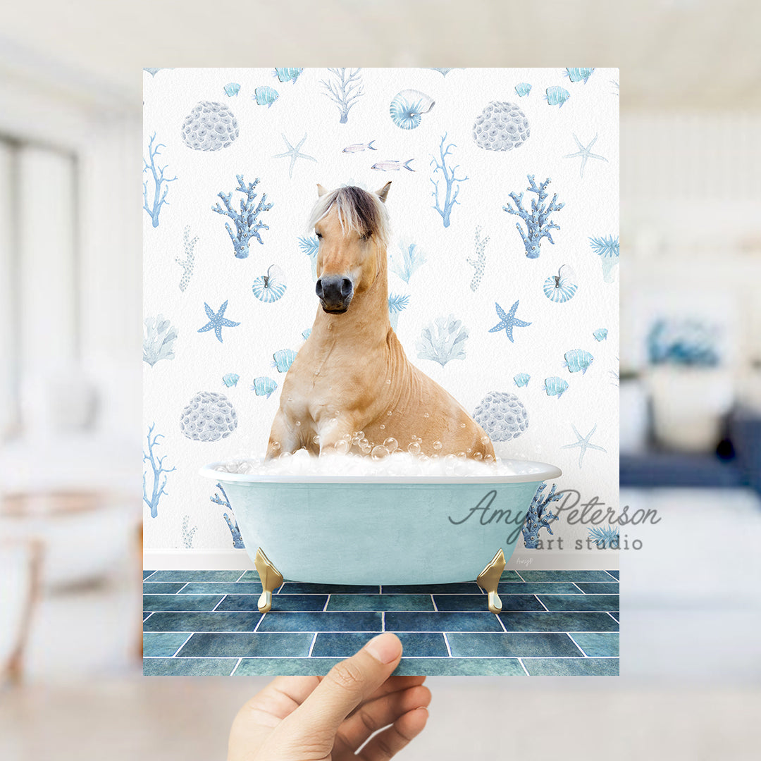 a hand holding up a card with a horse in a bathtub