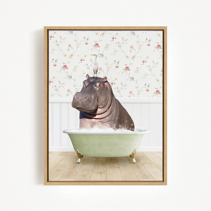 A hippopotamus sitting in a bathtub filled with water, surrounded by a floral wallpaper.
