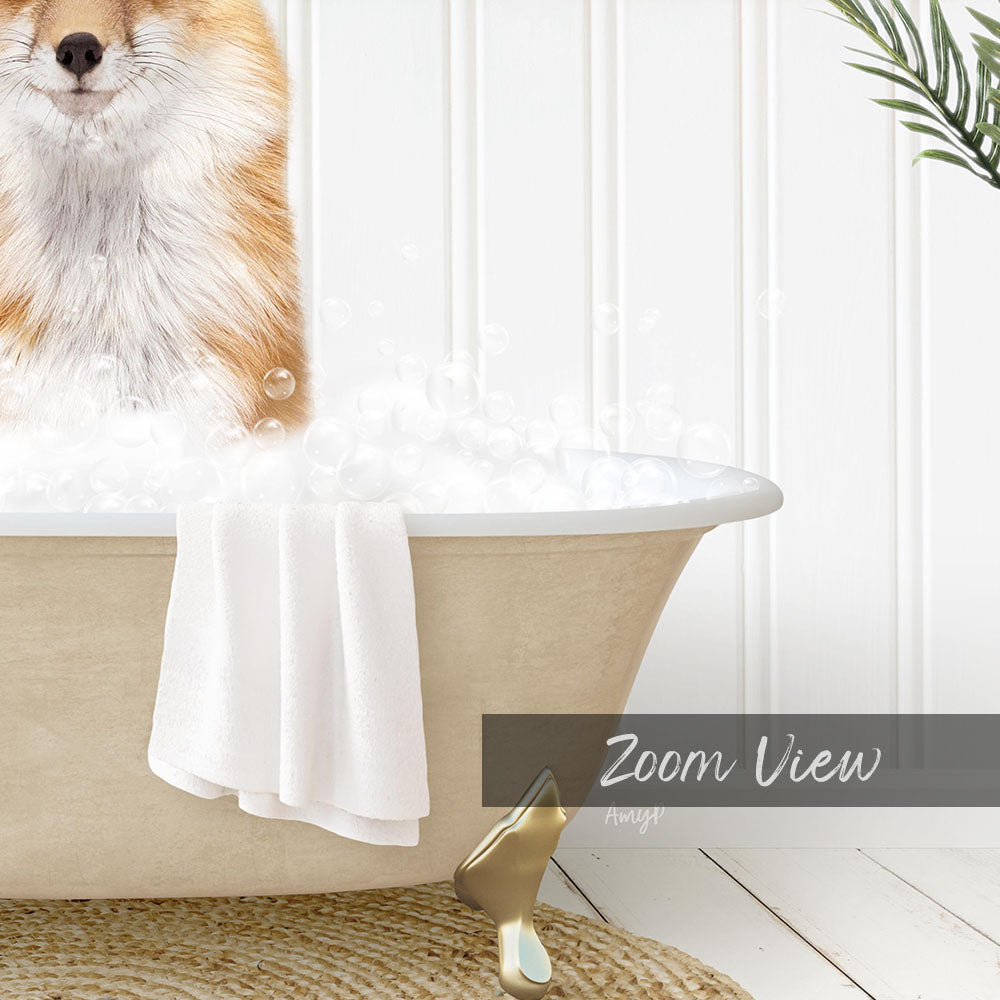 A fluffy dog is sitting in a bathtub filled with bubbles, with a towel and a gold-colored bathtub faucet visible.
