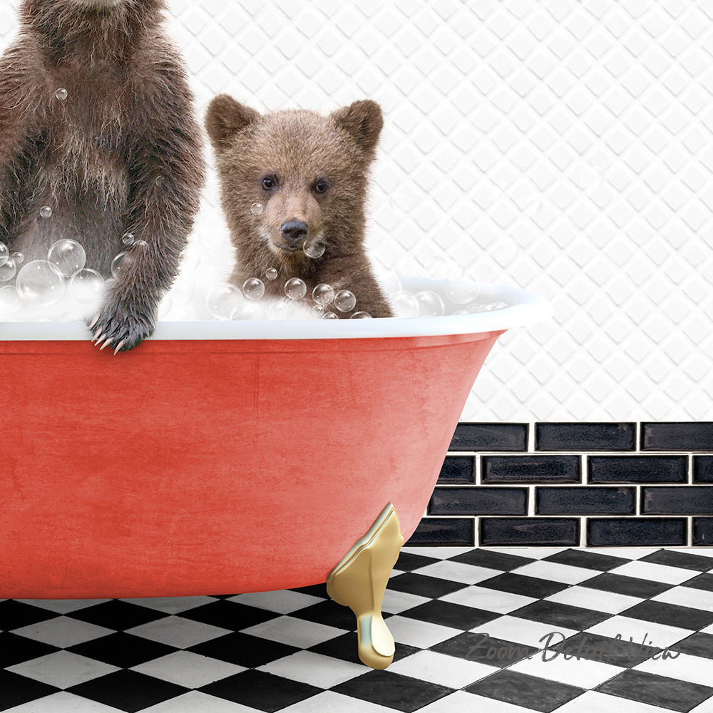 A red bathtub filled with bubbles, with two bears sitting inside, one larger bear and one smaller bear.