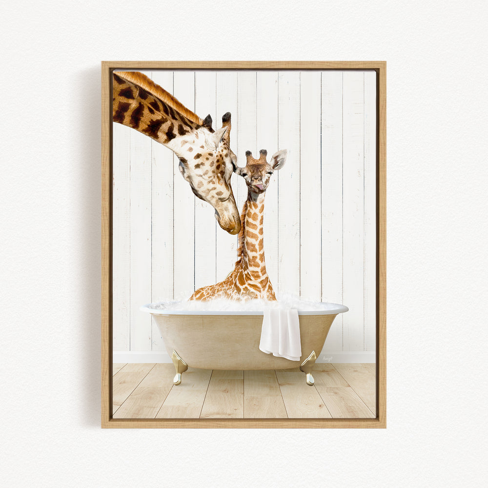 A mother giraffe and her baby giraffe are sitting together in a bathtub, with the mother gently licking her baby.