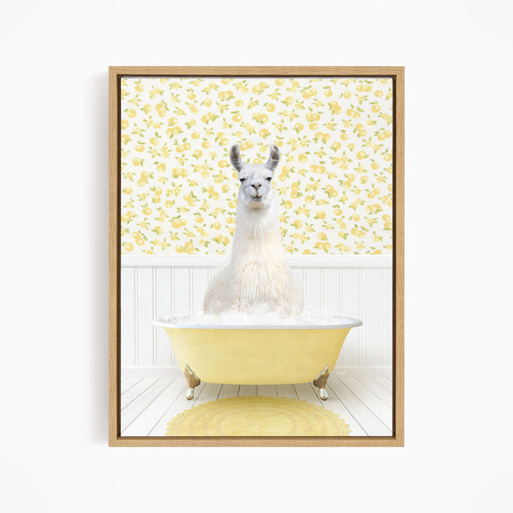 A white llama sitting in a yellow bathtub filled with bubbles, surrounded by a yellow floral wallpaper.