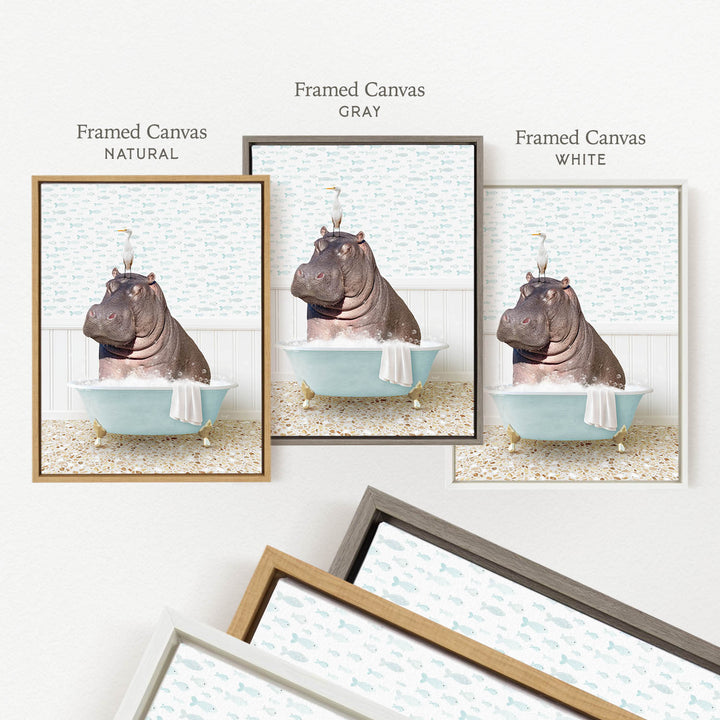 three framed pictures of a hippopotamus sitting in a bathtub, each with a different colored frame.