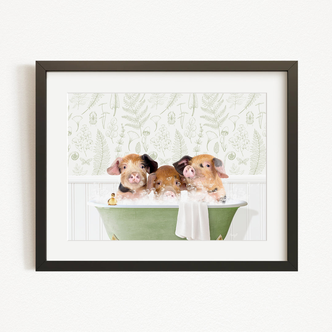 Three adorable pigs sitting in a green bathtub, enjoying a relaxing bath together.