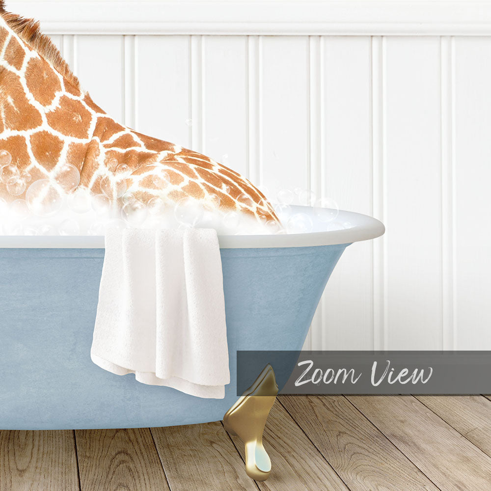 A giraffe is sitting in a blue bathtub filled with water, with a white towel hanging on the side of the tub.