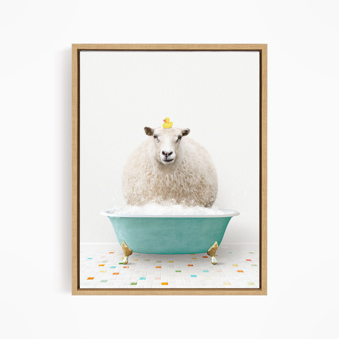 A fluffy white sheep sits in a blue bathtub filled with bubbles, with a yellow rubber duck perched on its head.