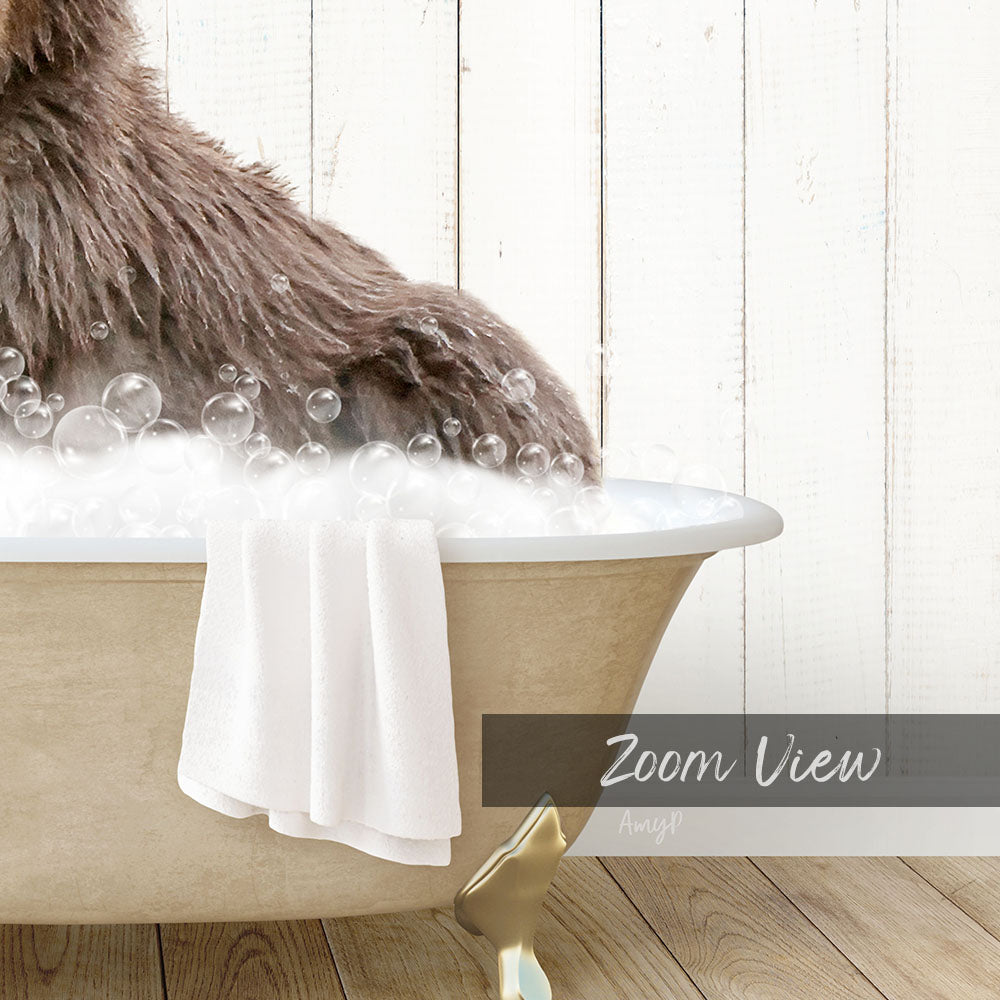A fluffy brown dog is sitting in a bathtub filled with bubbles, with a towel draped over the side.