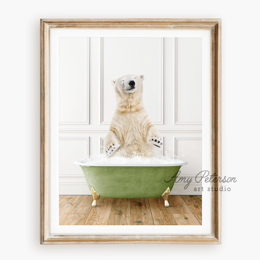 a polar bear sitting in a green bath tub