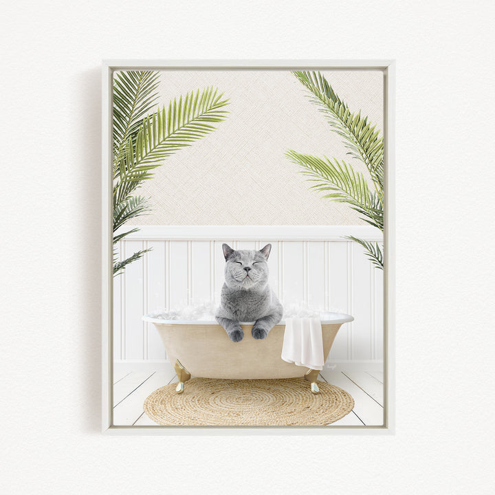A gray cat sitting in a bathtub filled with water, surrounded by green plants.