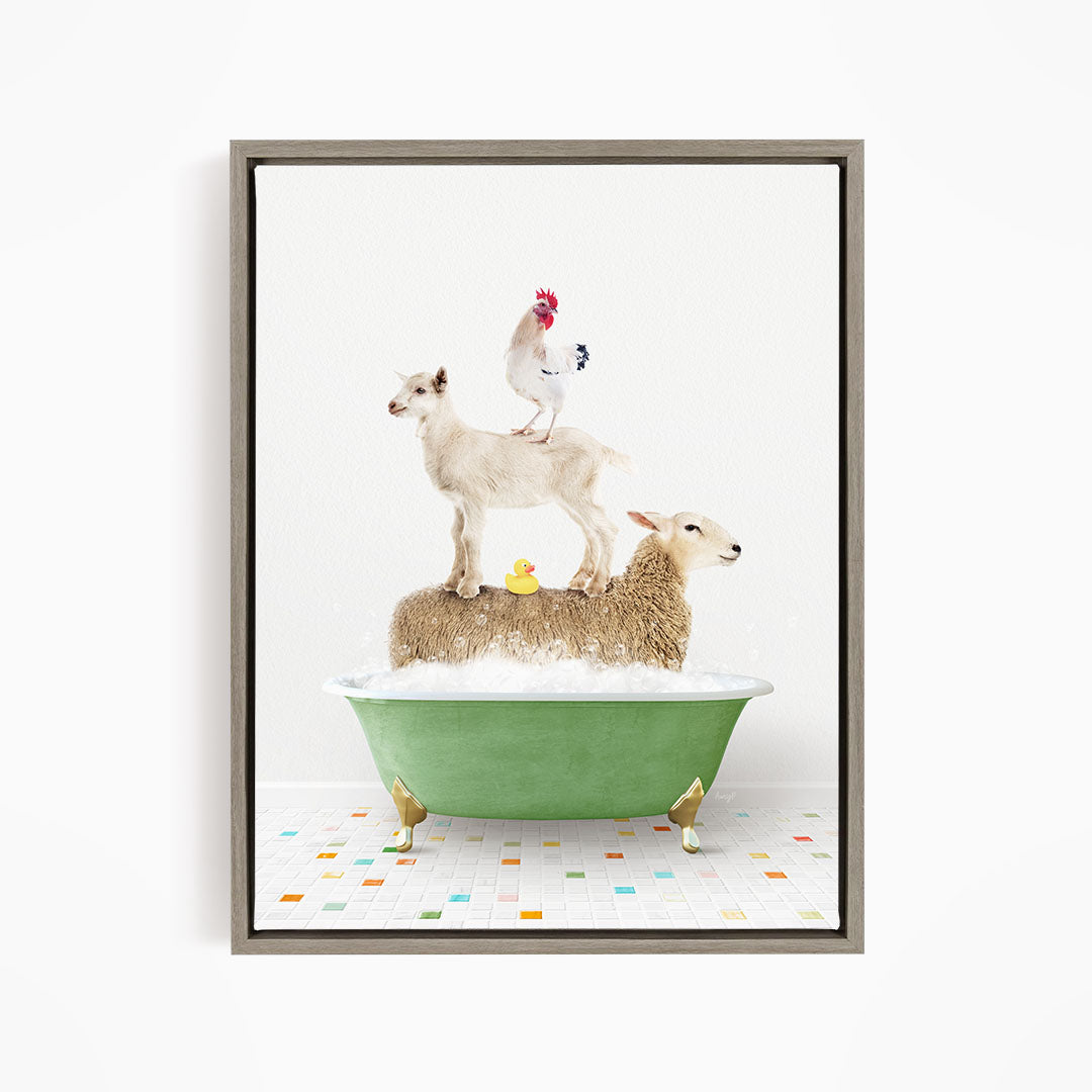A framed image depicting a sheep standing on a goat's back while a chicken stands on the sheep's back, all in a green bathtub.