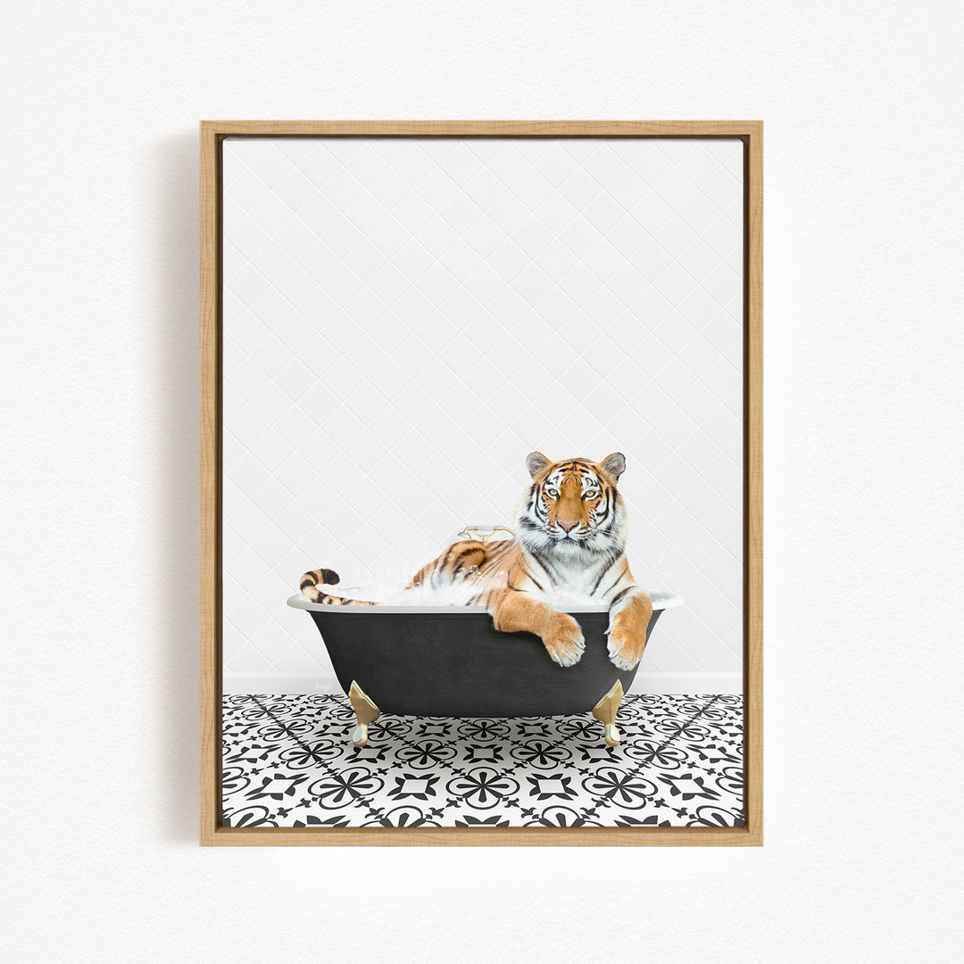 A tiger is sitting in a bathtub filled with water, surrounded by a black and white patterned floor.