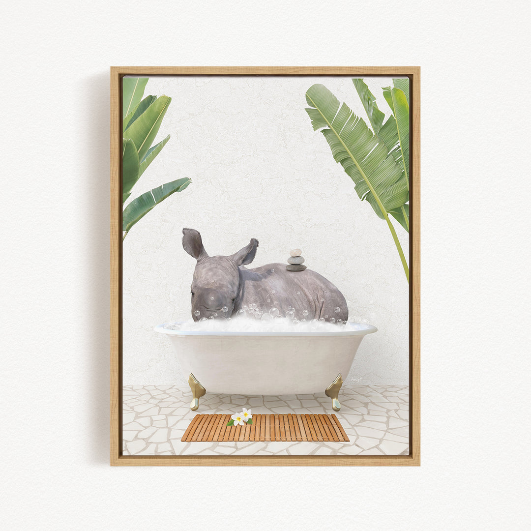 A rhinoceros is sitting in a bathtub filled with water, surrounded by tropical plants and a wooden mat on the floor.