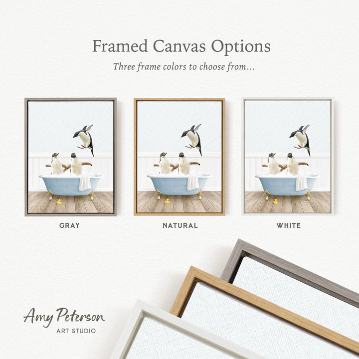 The image is a framed canvas option showcasing three different frame colors: gray, natural, and white. The canvas features a scene of three penguins in a bathtub, with one penguin jumping out of the tub.