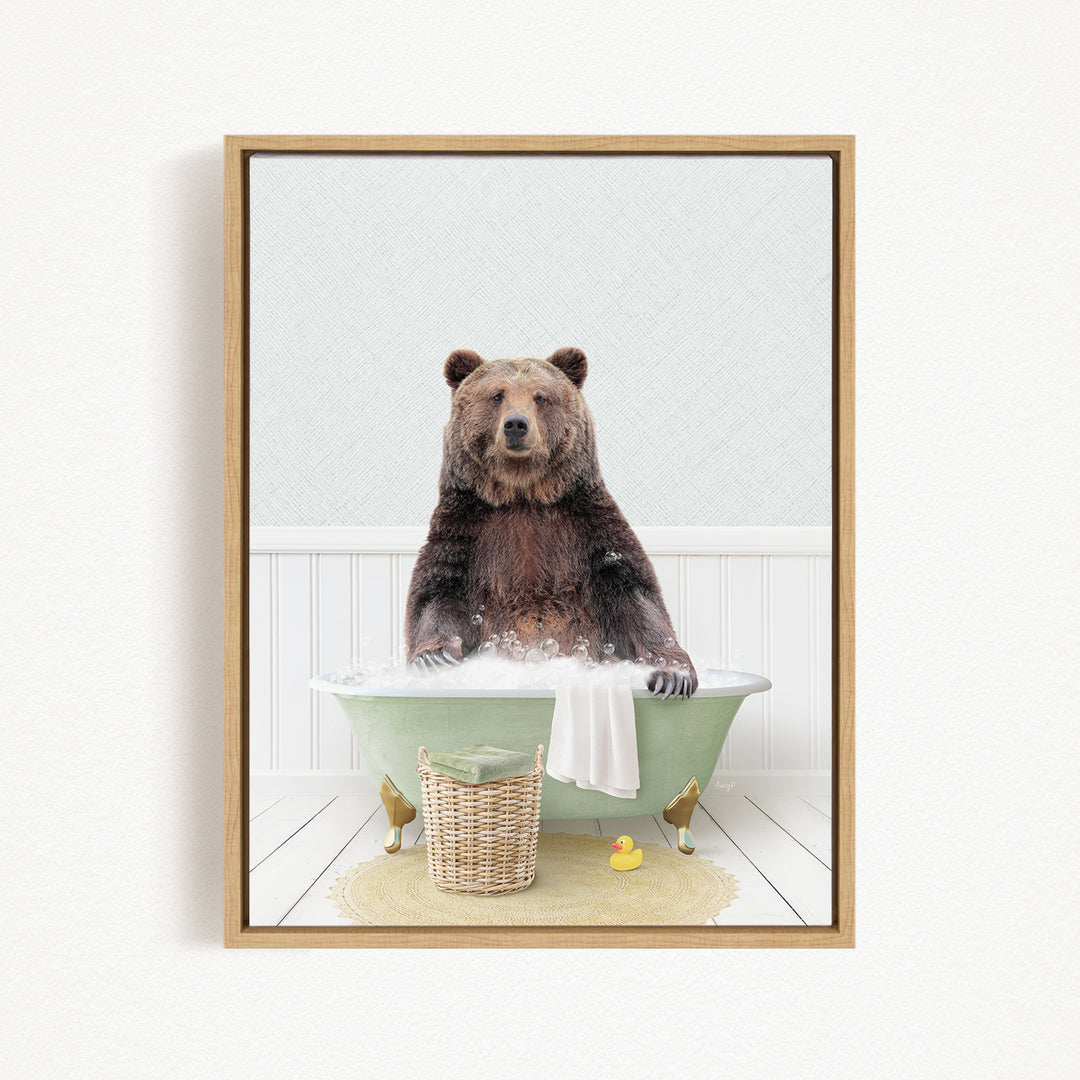 A brown bear sitting in a green bathtub filled with water, surrounded by a basket of toys and a yellow rubber duck.