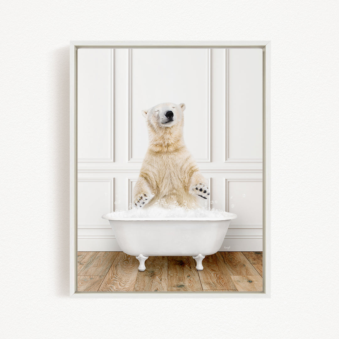 A polar bear standing in a white bathtub filled with water, appearing to enjoy the bath.
