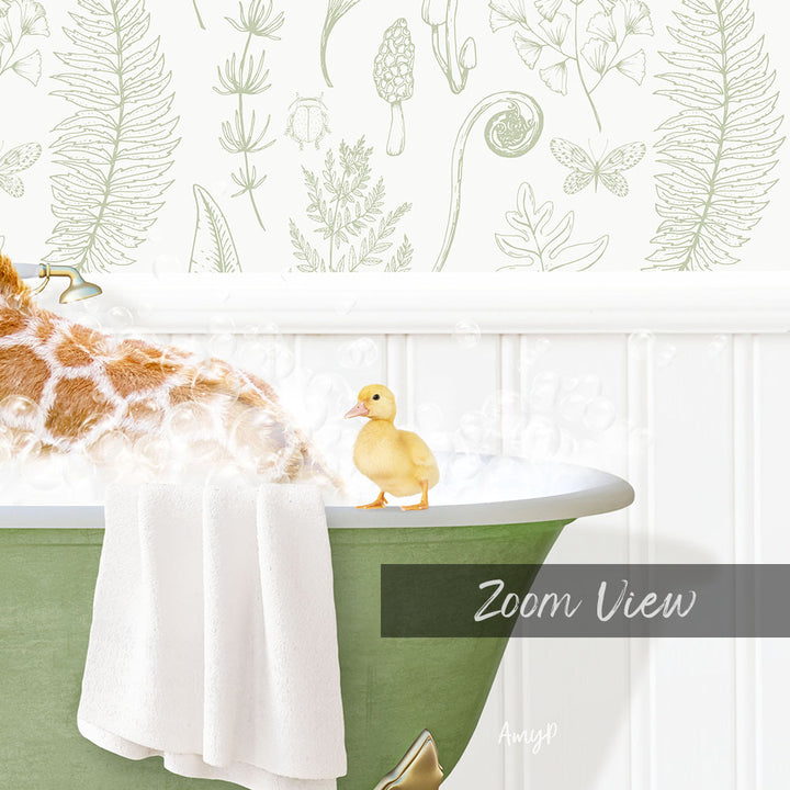 A giraffe is taking a bath in a green bathtub, with a small yellow duck sitting on the edge of the tub.