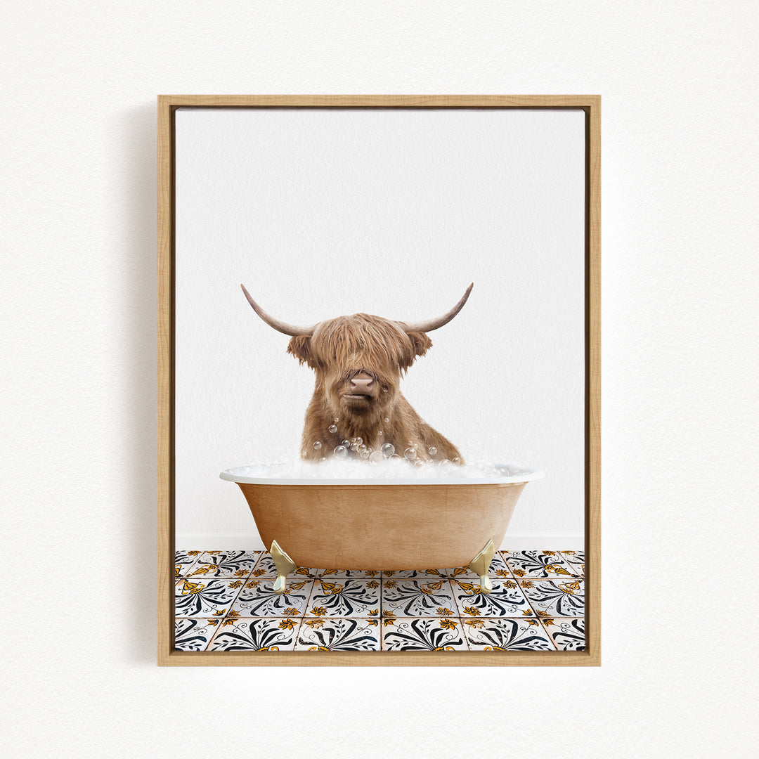 A Highland cow with long horns is sitting in a bathtub filled with bubbles, creating a whimsical and playful scene.