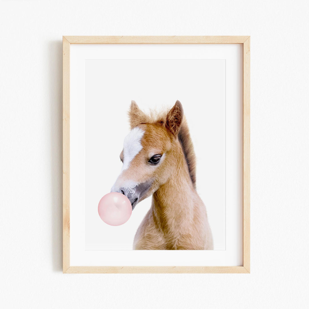 a picture of a horse with a bubble in it's mouth