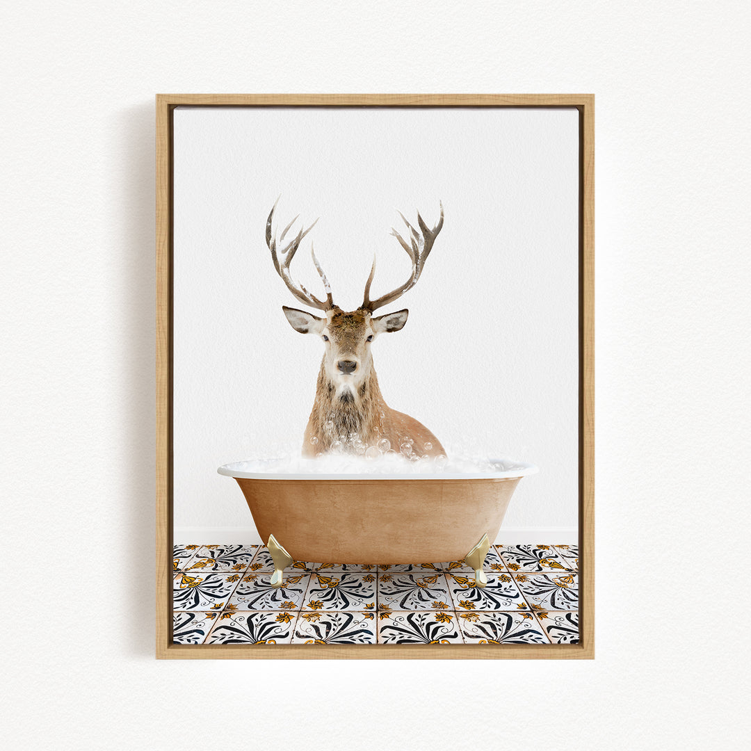 A deer with large antlers is sitting in a bathtub filled with bubbles, creating a whimsical and playful scene.