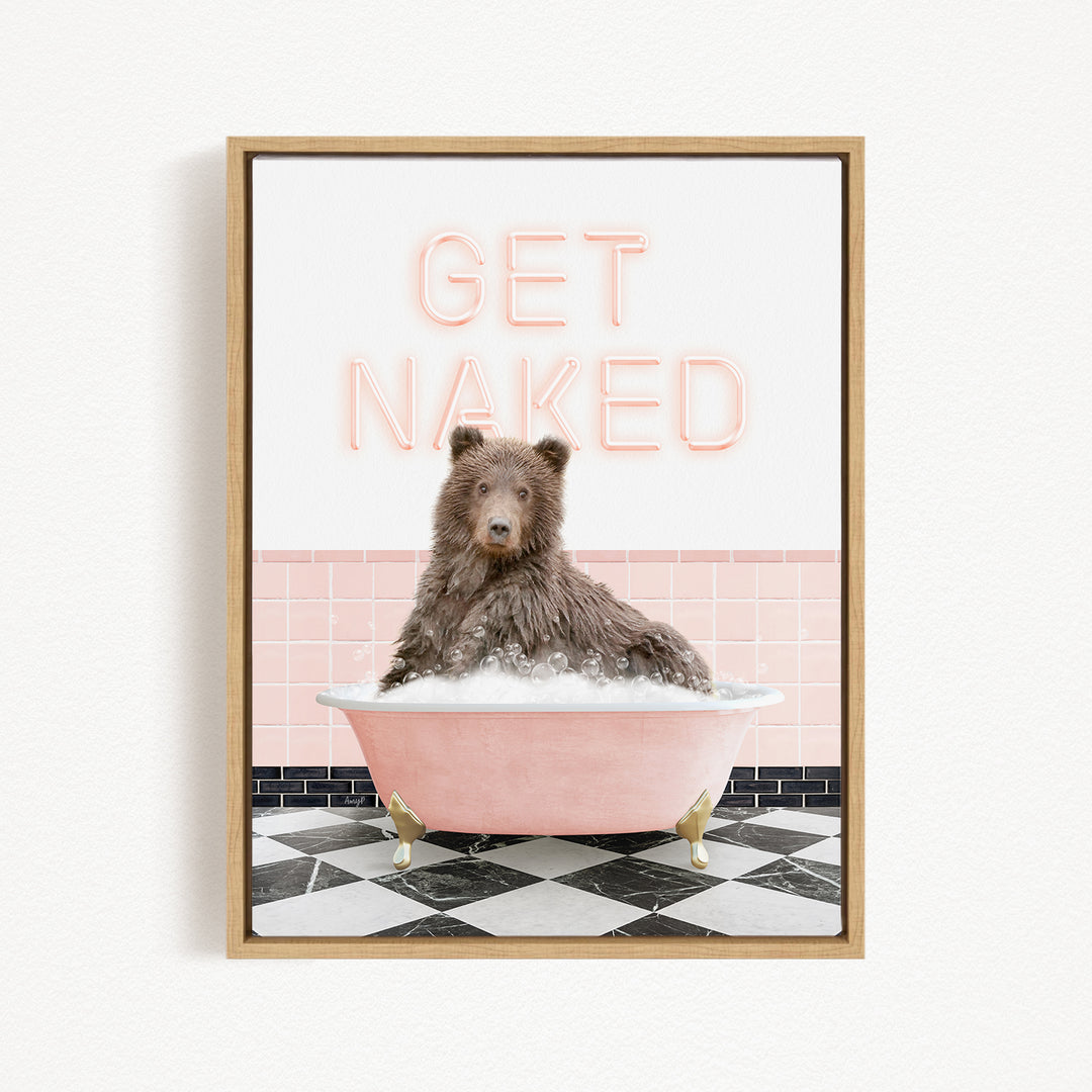 A brown bear sitting in a pink bathtub with the text "GET NAKED" displayed above it.