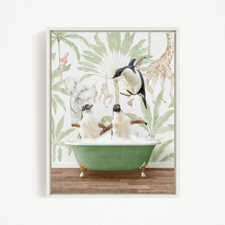 A framed image depicting two penguins sitting in a green bathtub, surrounded by a tropical jungle wallpaper with various animals such as a giraffe, elephant, and parrot.