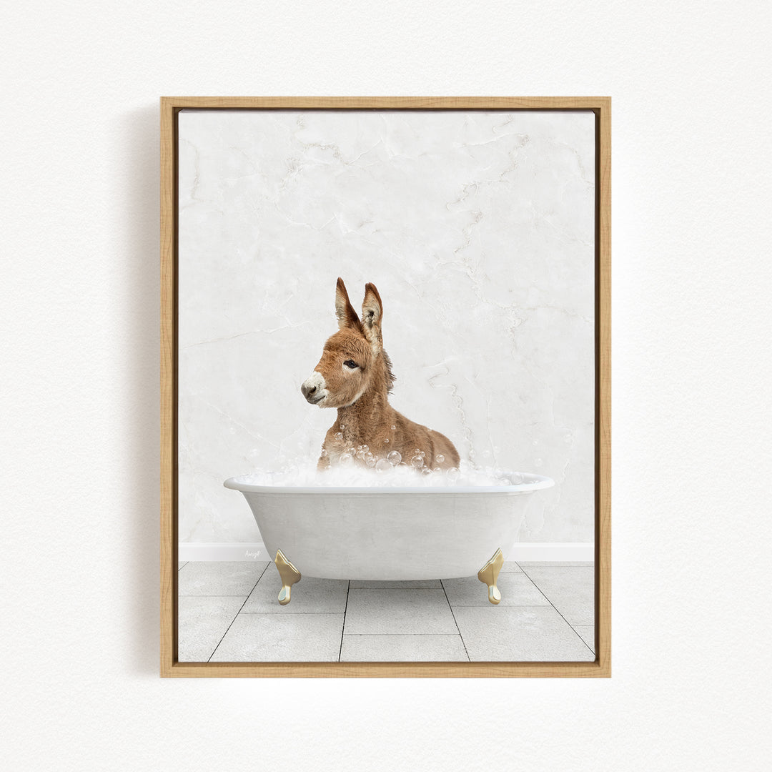 A donkey is sitting in a white bathtub filled with water, creating a playful and whimsical scene.