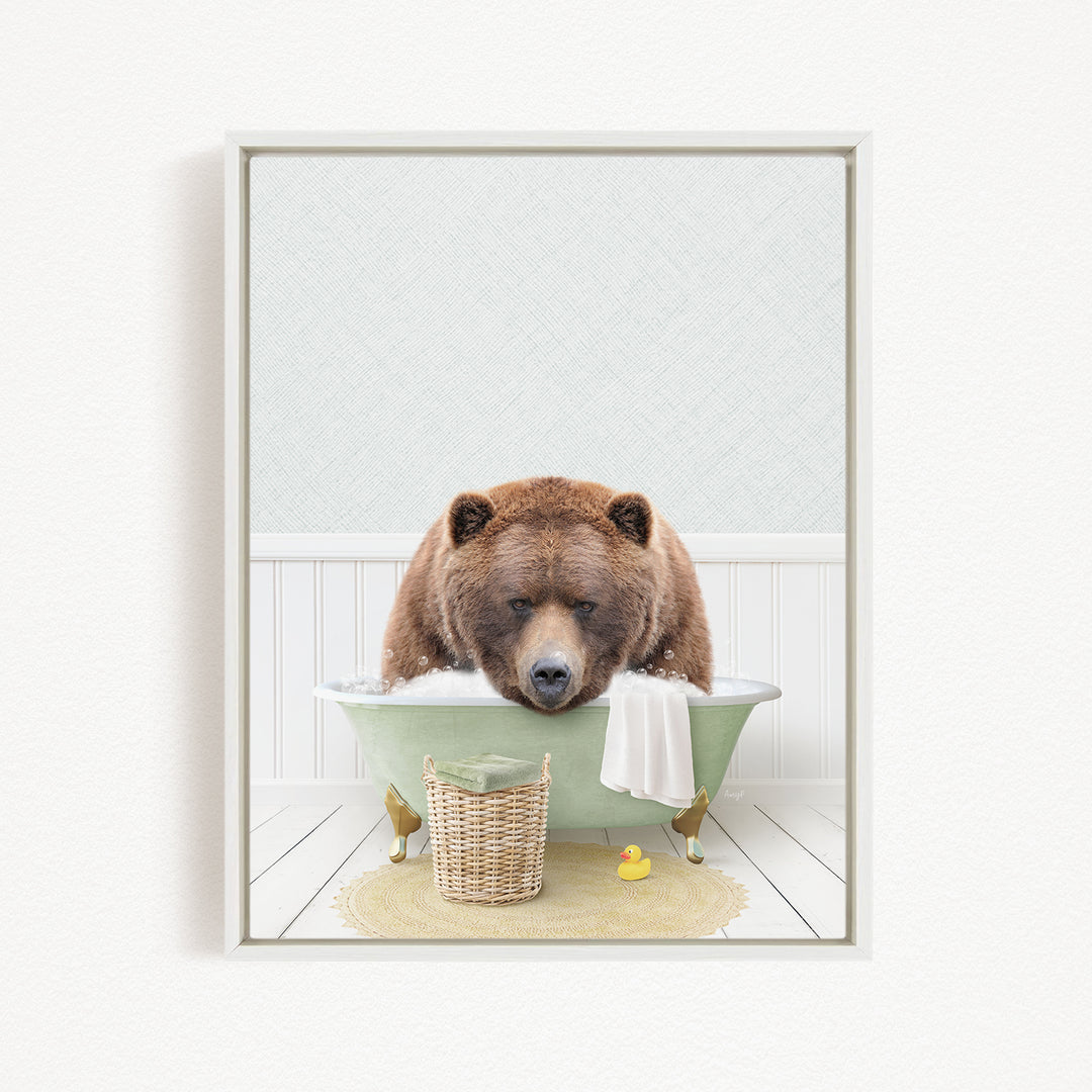 A brown bear is sitting in a green bathtub filled with water, surrounded by rubber ducks and a towel.
