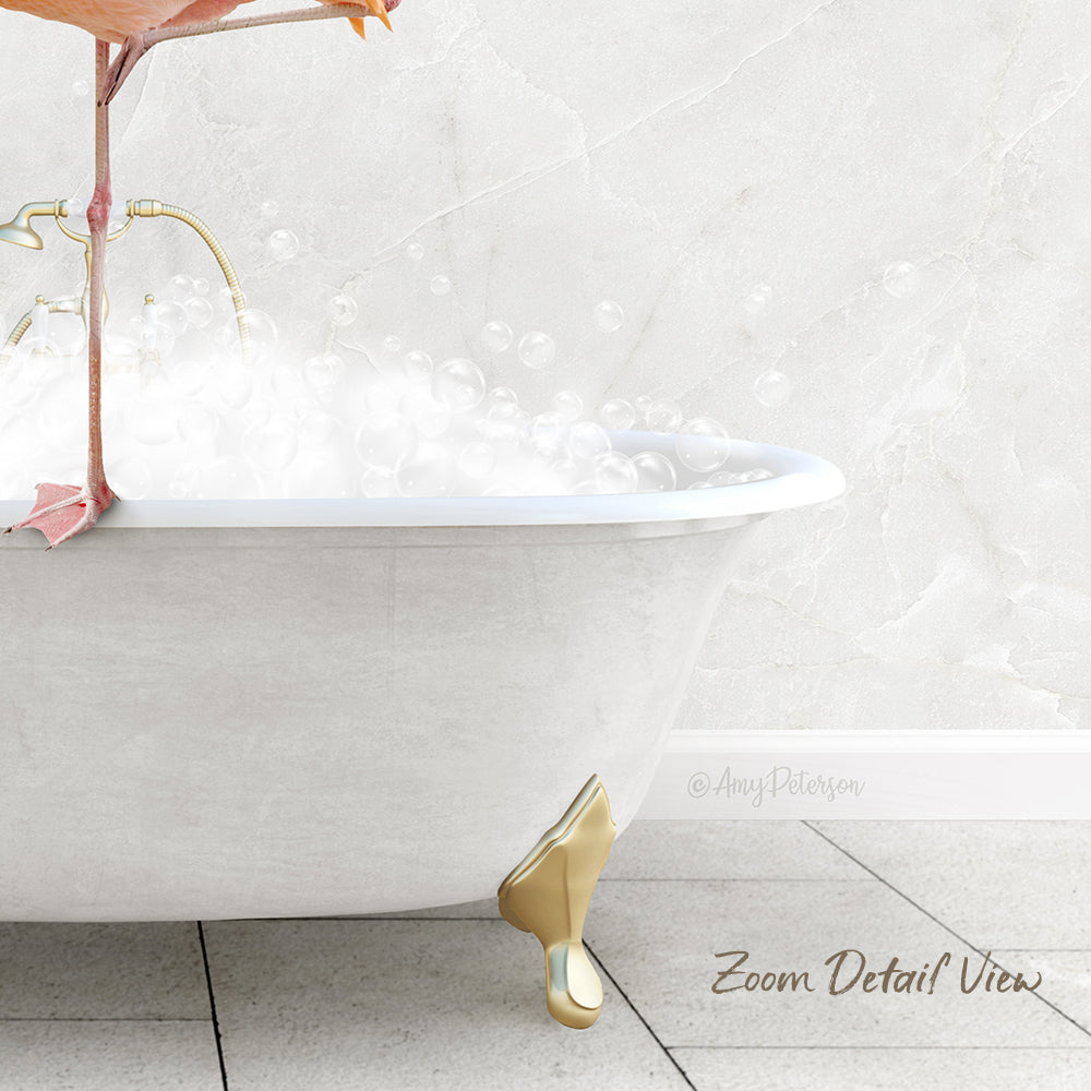 A white claw-foot bathtub filled with bubbles, with a pink flamingo perched on the edge.