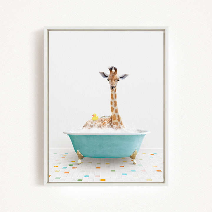 A giraffe sitting in a blue bathtub filled with bubbles, surrounded by a yellow rubber duck.