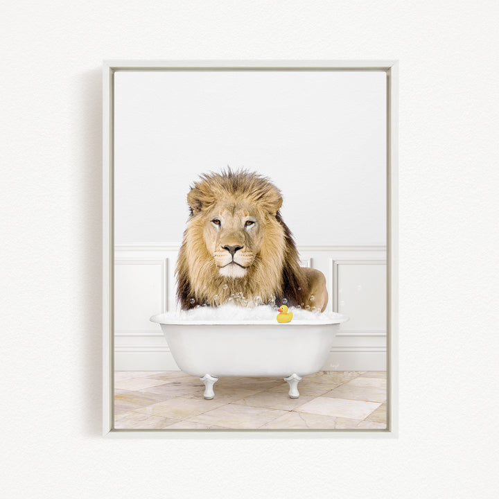 A lion sitting in a white bathtub, surrounded by bubbles and a rubber duck.
