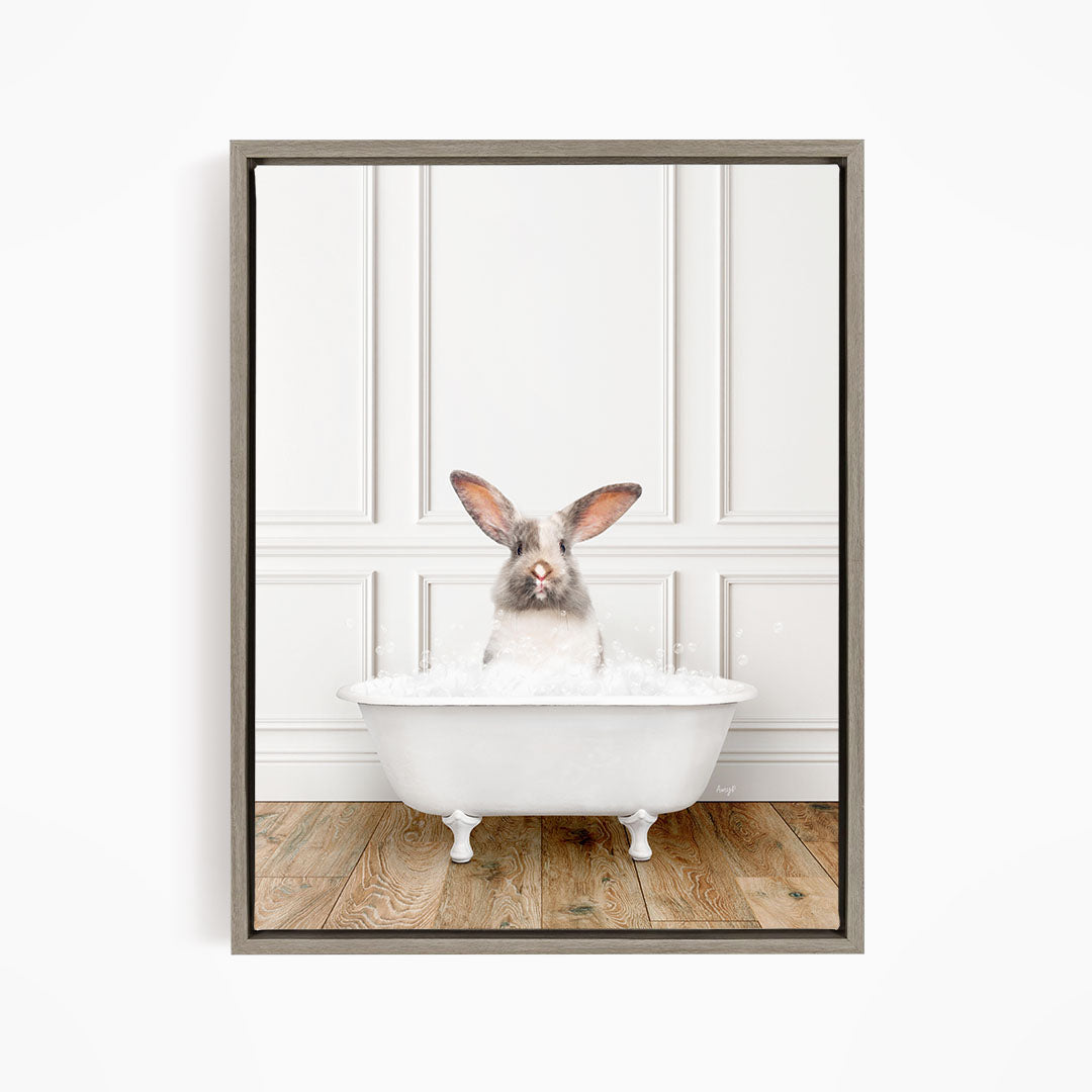 A white rabbit sitting in a white bathtub filled with water, with its head above the water level.