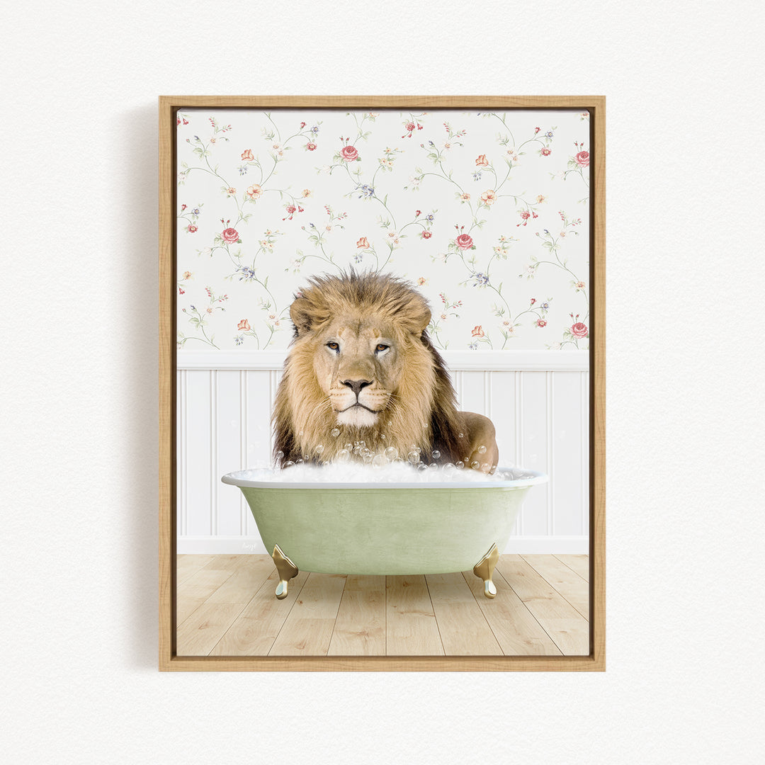 A lion is sitting in a green bathtub filled with water, surrounded by a floral wallpaper.