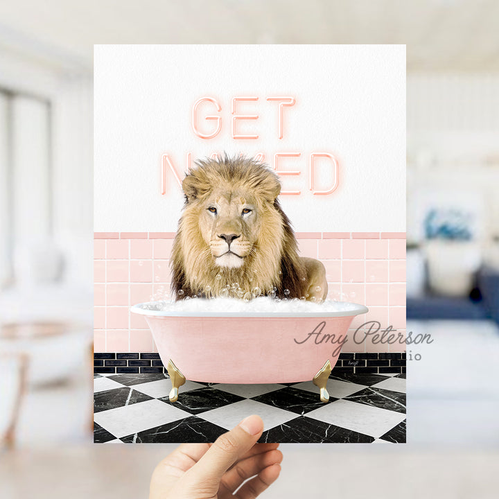 a hand holding a card with a lion in a bathtub