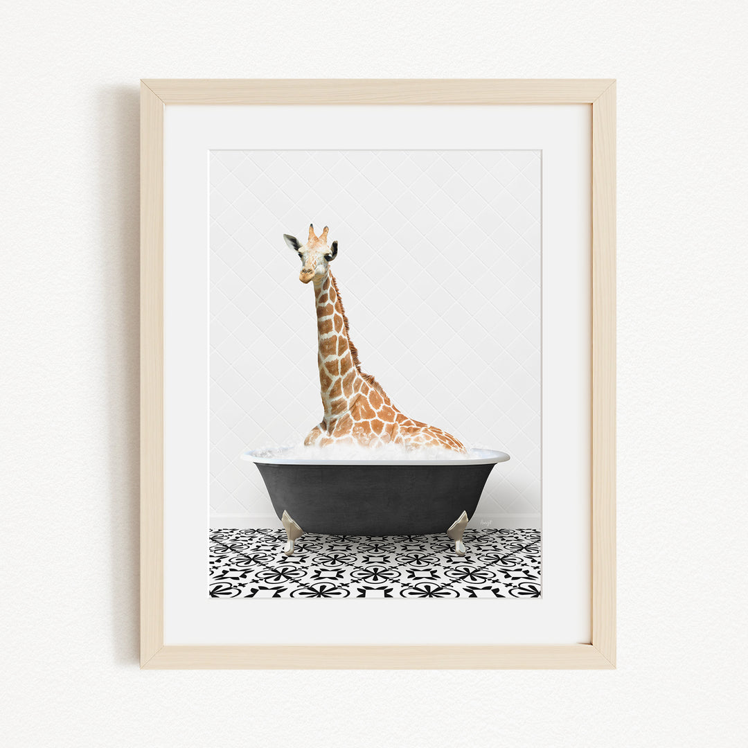 A giraffe is sitting in a black bathtub filled with water, creating a whimsical and playful scene.