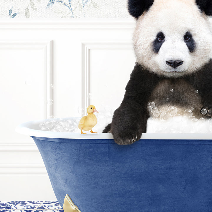 a panda bear sitting in a bathtub with a rubber duck