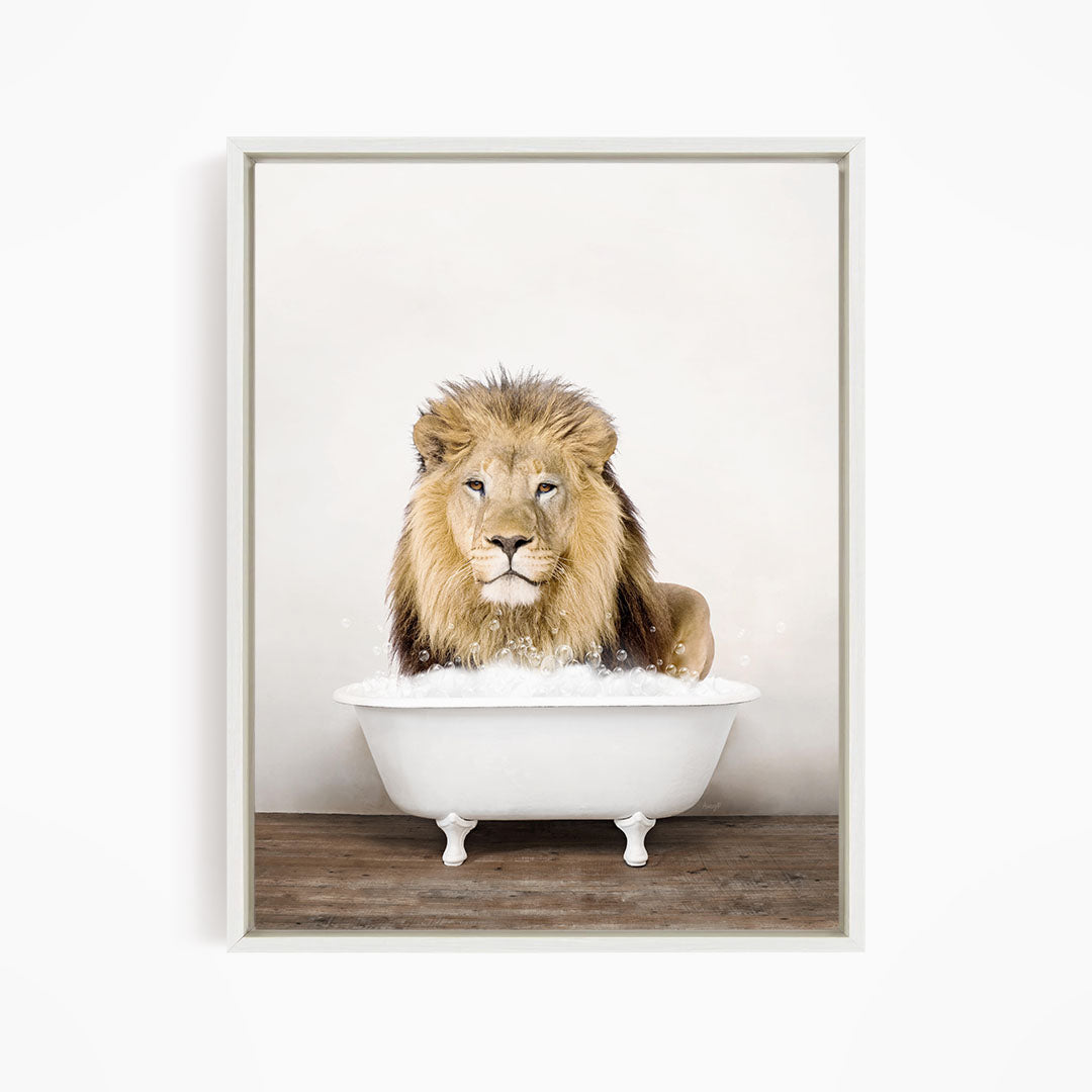 A majestic lion sits in a white bathtub filled with bubbles, exuding a sense of luxury and relaxation.