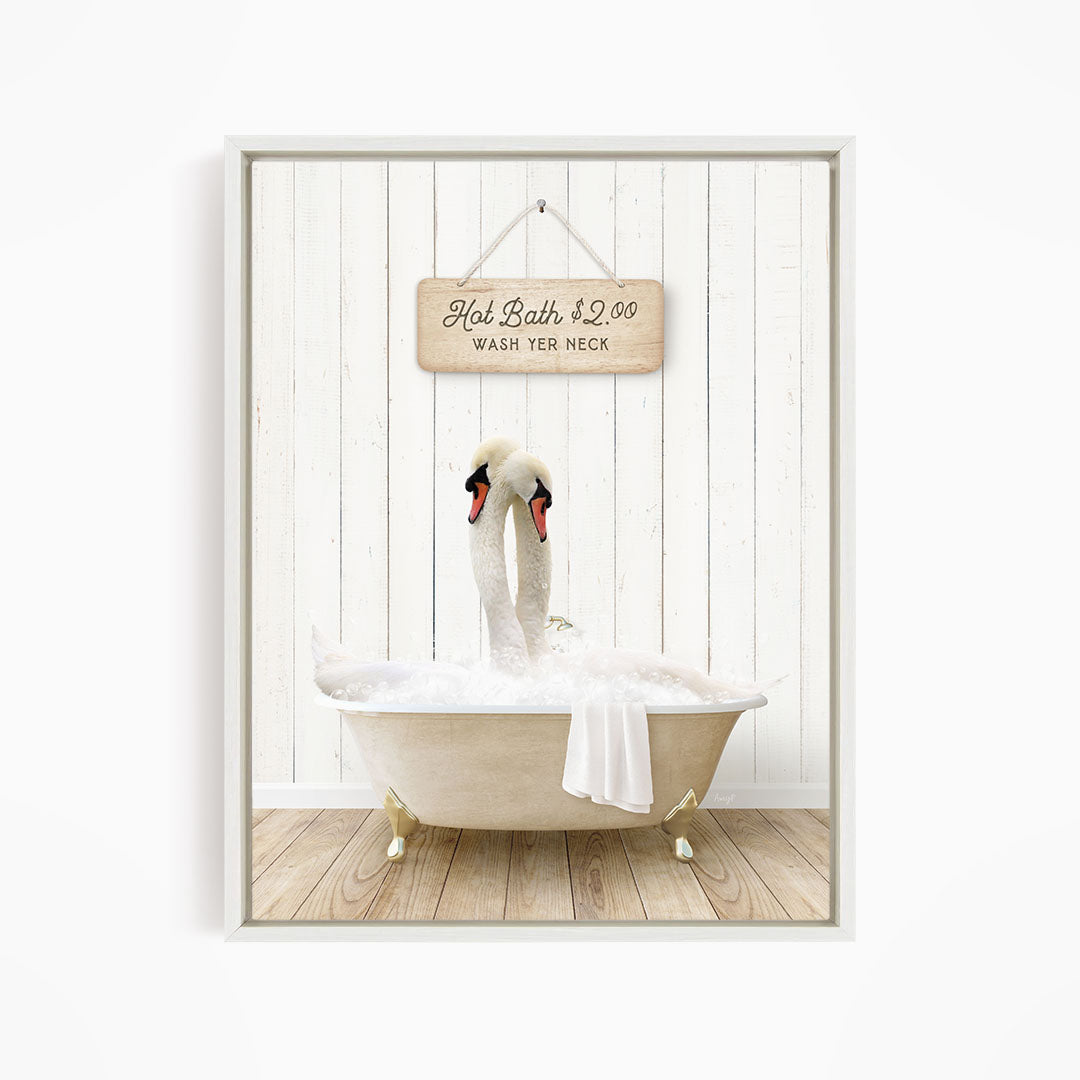 A framed image of two swans sitting in a bathtub, with a sign above them that reads "Hot Bath $2.00 WASH YER necks".