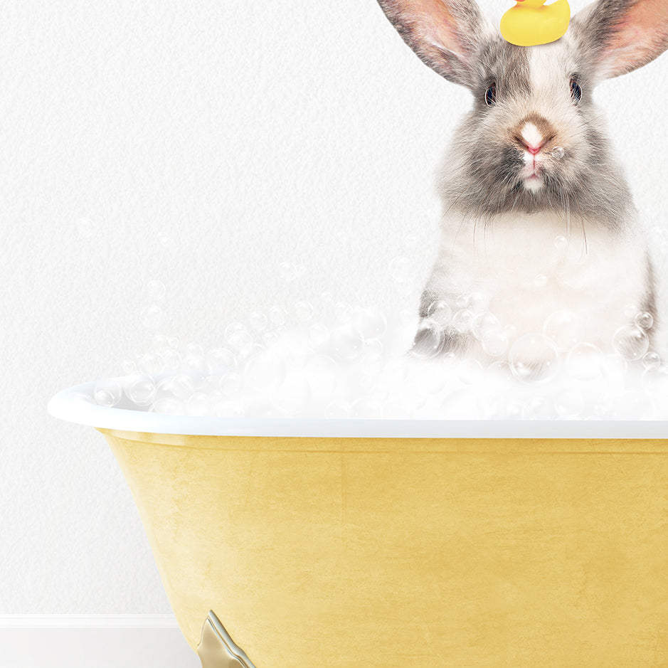 a rabbit in a bathtub with a rubber duck on its head