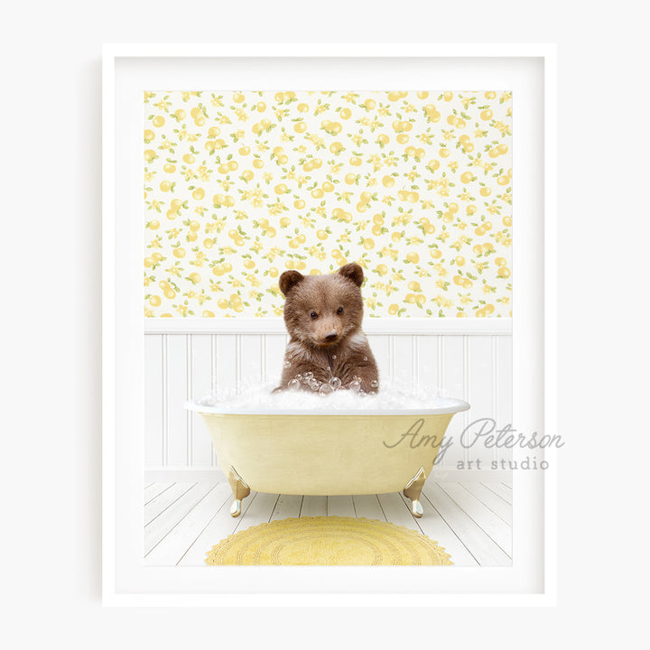 a brown teddy bear sitting in a bath tub