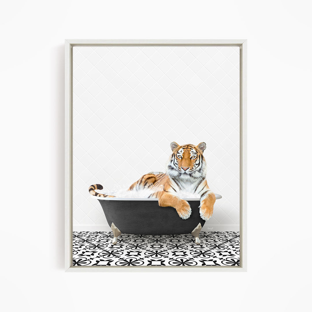 A tiger is sitting in a bathtub filled with water, surrounded by a black and white patterned floor.