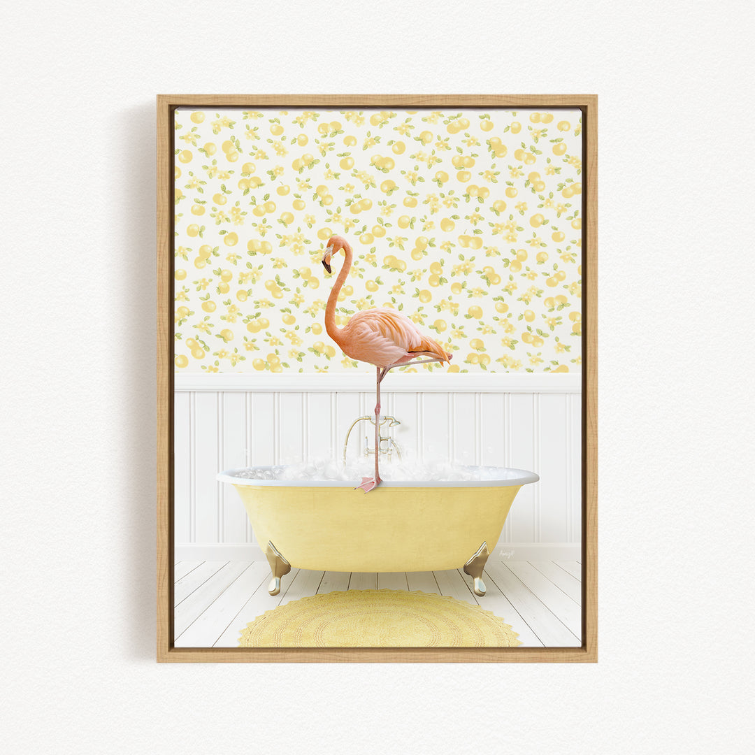 A pink flamingo stands on a yellow bathtub in a bathroom with a yellow and white floral wallpaper.