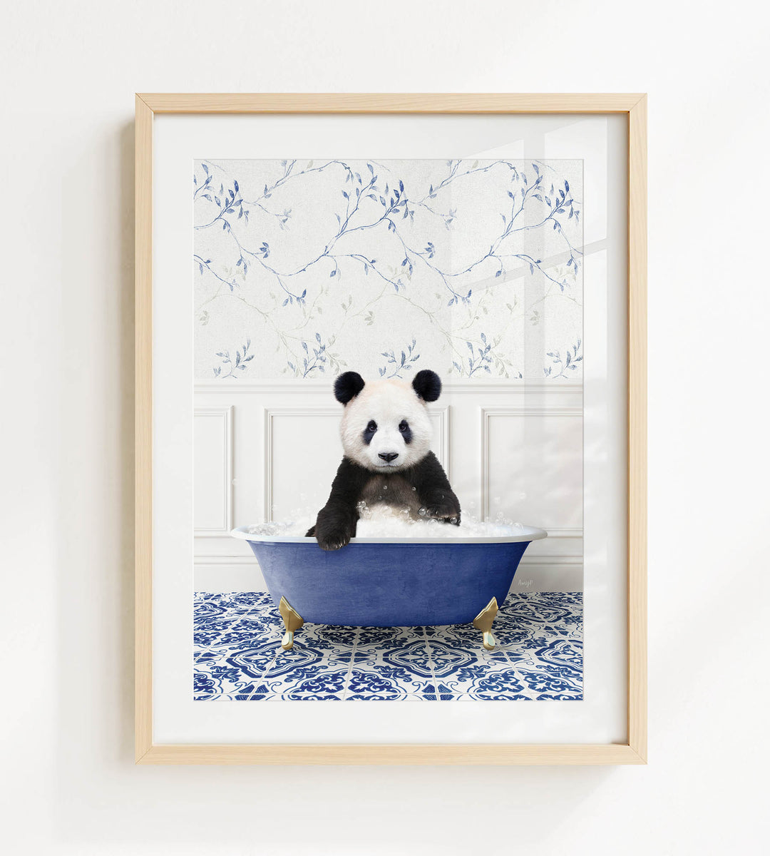 A panda bear sitting in a blue bathtub, surrounded by a blue and white floral patterned wall.