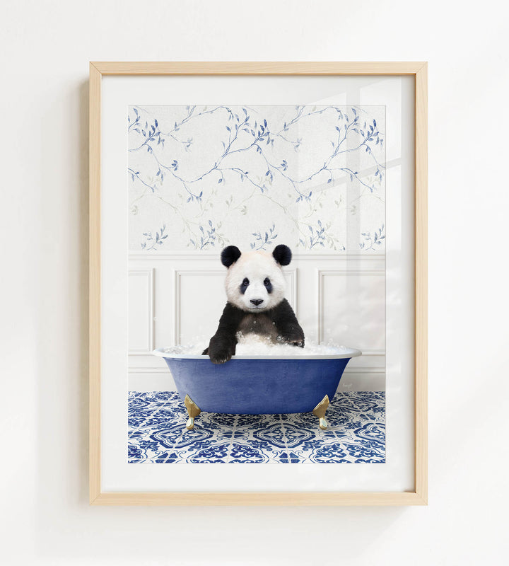 A panda bear sitting in a blue bathtub, surrounded by a blue and white floral patterned wall.