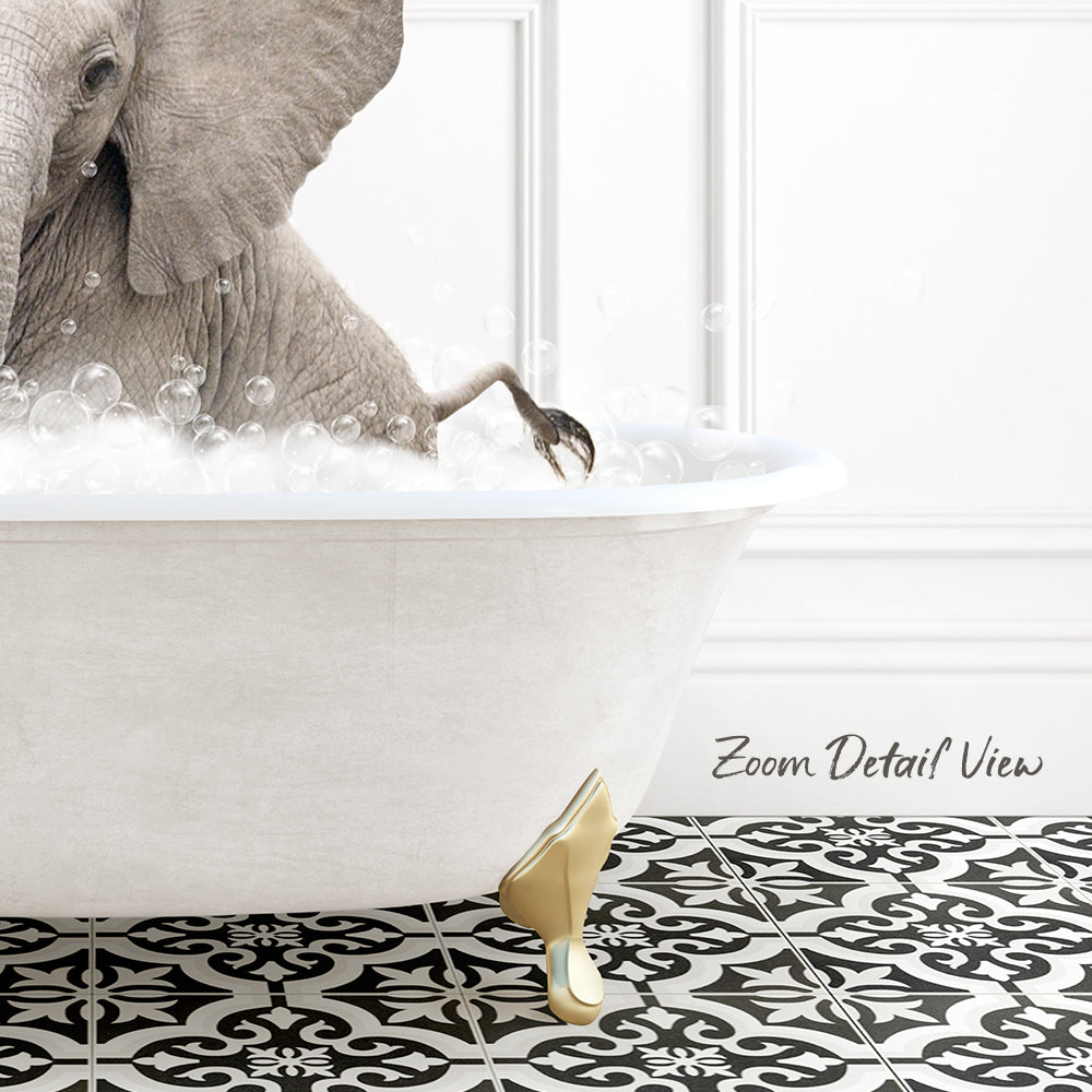 A large elephant is sitting in a white bathtub filled with bubbles, creating a whimsical and playful scene.
