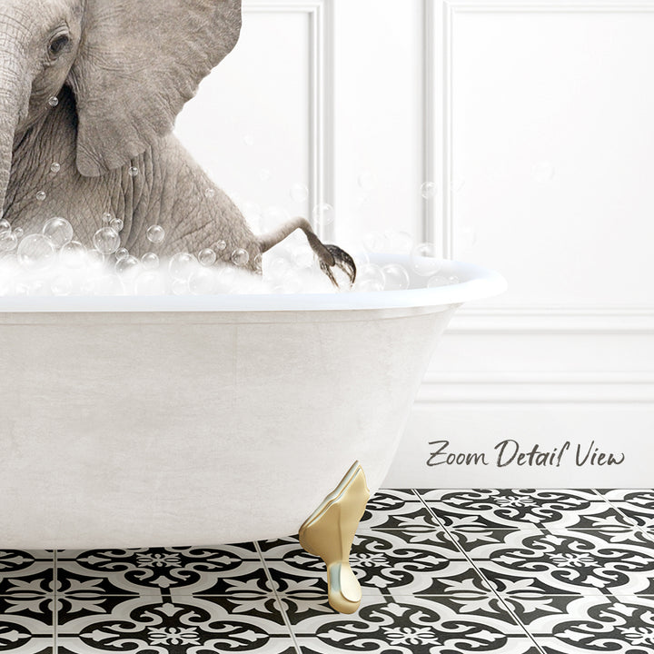 A large elephant is sitting in a white bathtub filled with bubbles, creating a whimsical and playful scene.