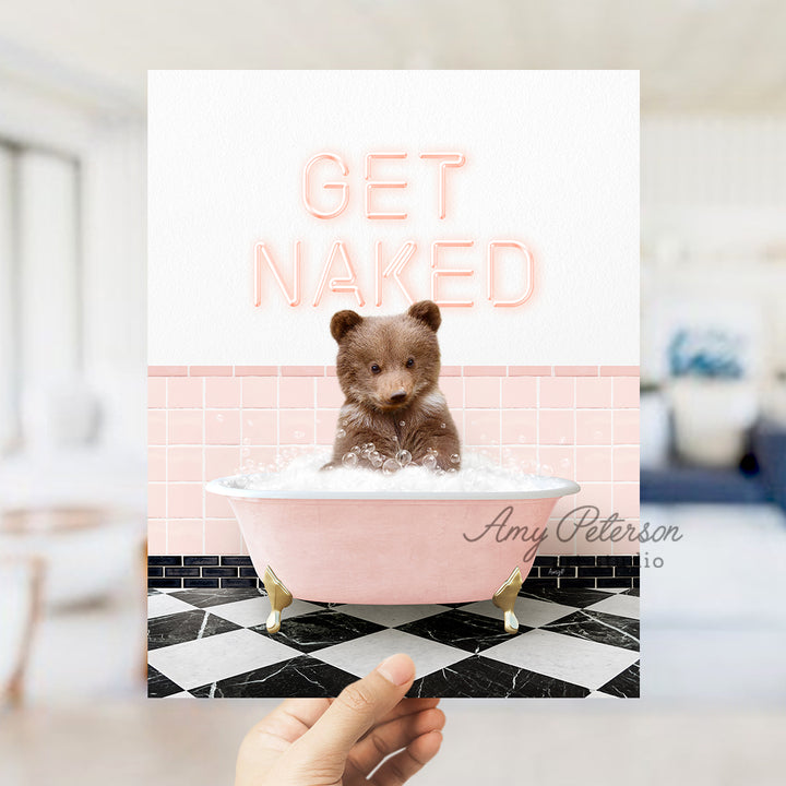 a person holding up a card with a picture of a teddy bear in a bath