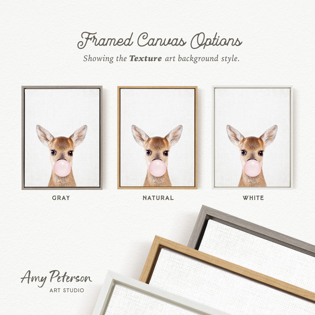 three framed canvas options, each featuring a picture of a deer blowing a bubble gum bubble. The options are labeled "GRAY", "NATURAL", and "WHITE".