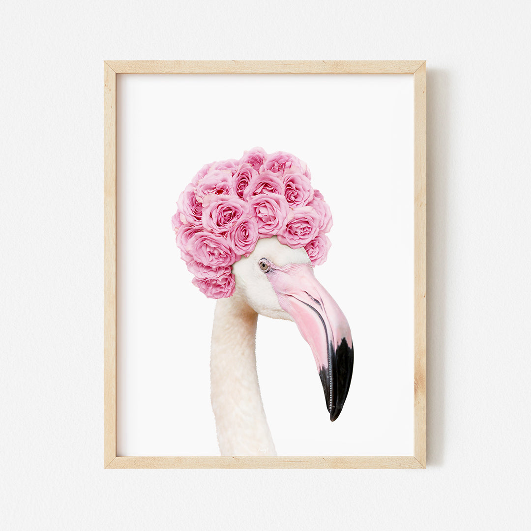 a flamingo with a pink flower crown on its head