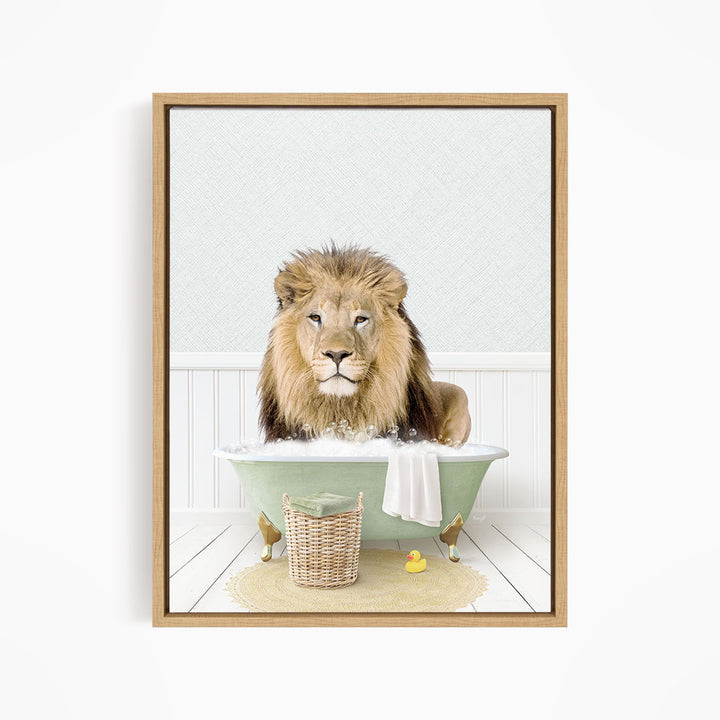 A lion sitting in a green bathtub filled with water, surrounded by a basket of toys and a yellow rubber ducky.